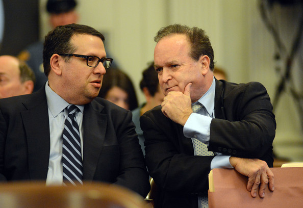 2 men in court both sitting